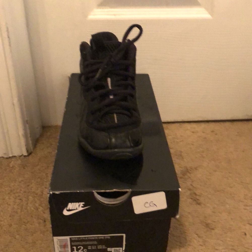 Lil kids size 12 black foam posites.